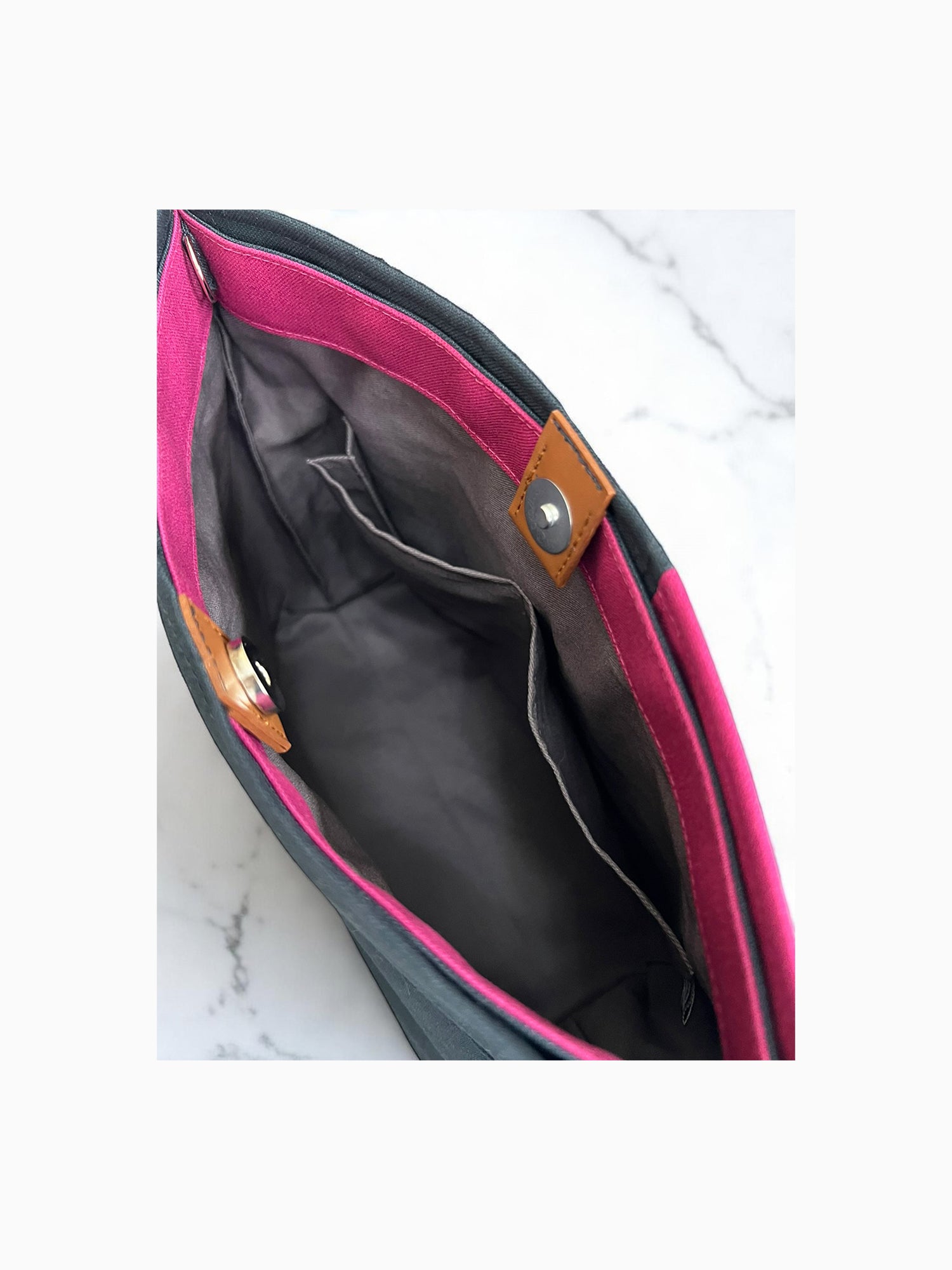 Interior of the NUIdesign Midnight and Fuchsia Rose tote bag, showing inner pocket and magnetic snap, handmade from Japanese cotton canvas.