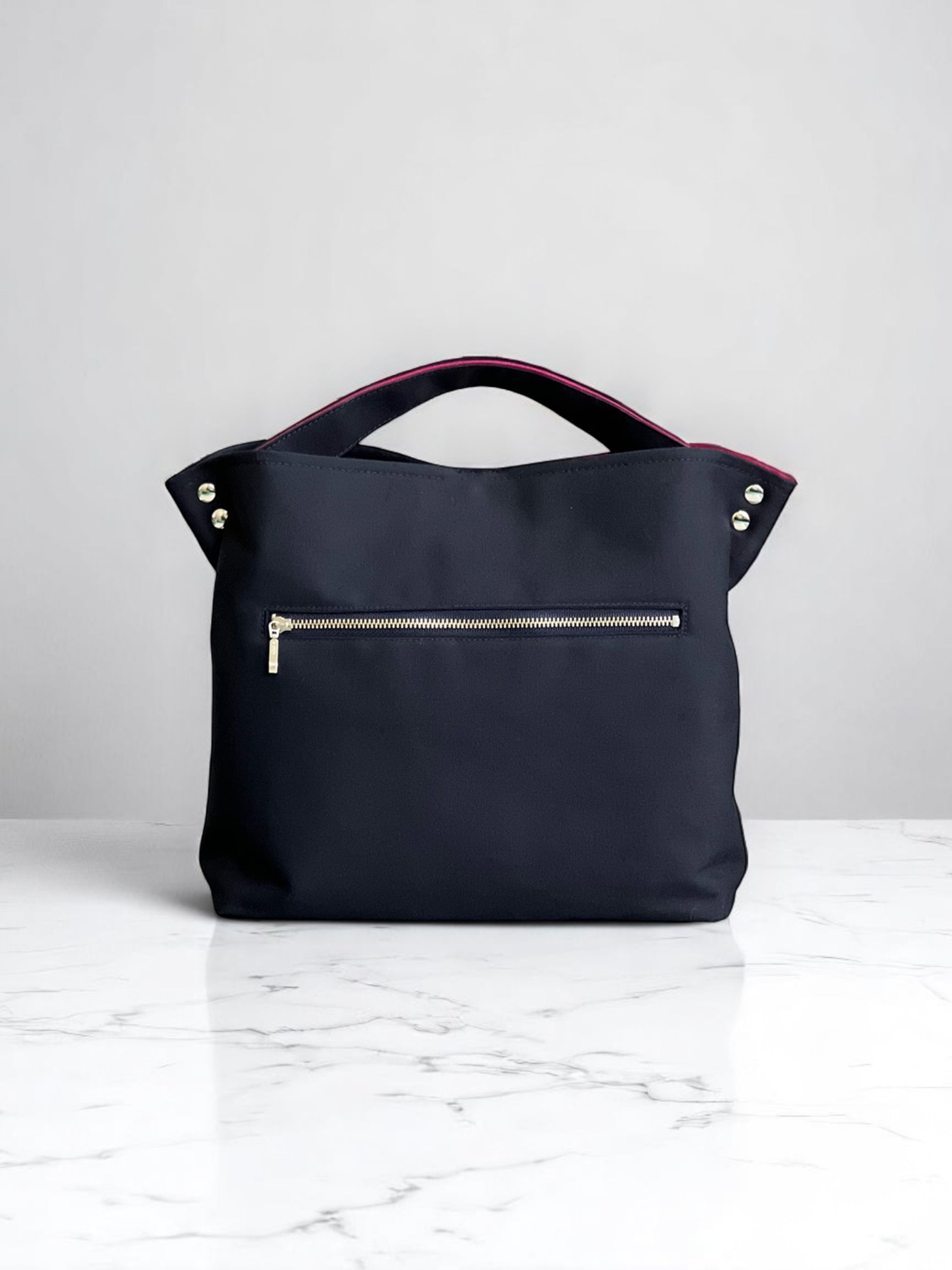 Back view of the NUIdesign Midnight and Fuchsia Rose two-tone tote bag, handmade from Japanese cotton canvas.